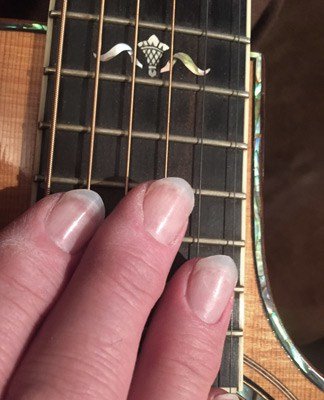 Can You Play Acoustic Guitar With Nails