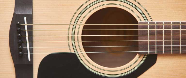 Why Do Acoustic Guitars Have Fewer Frets