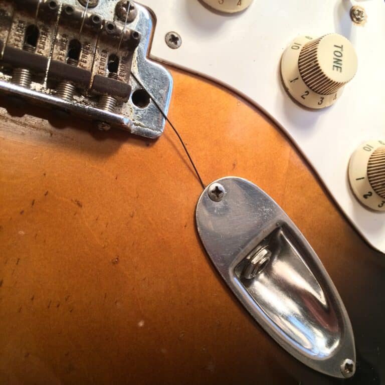 Are Electric Guitar Strings Grounded