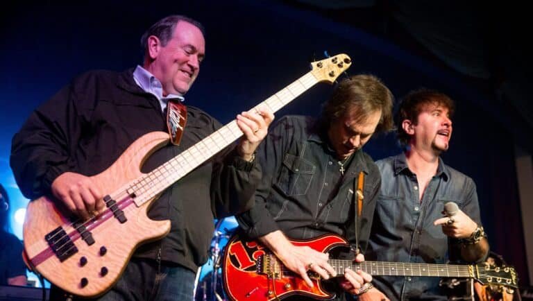 Does Mike Huckabee Play Bass Guitar